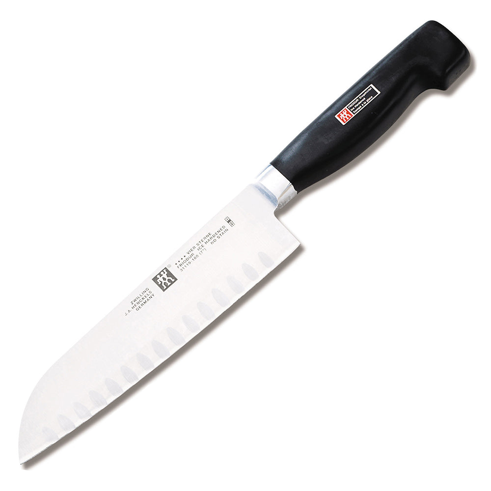 Zwilling J.A. Henckels Four Star 7-inch hollow-edge santoku knife with black handle