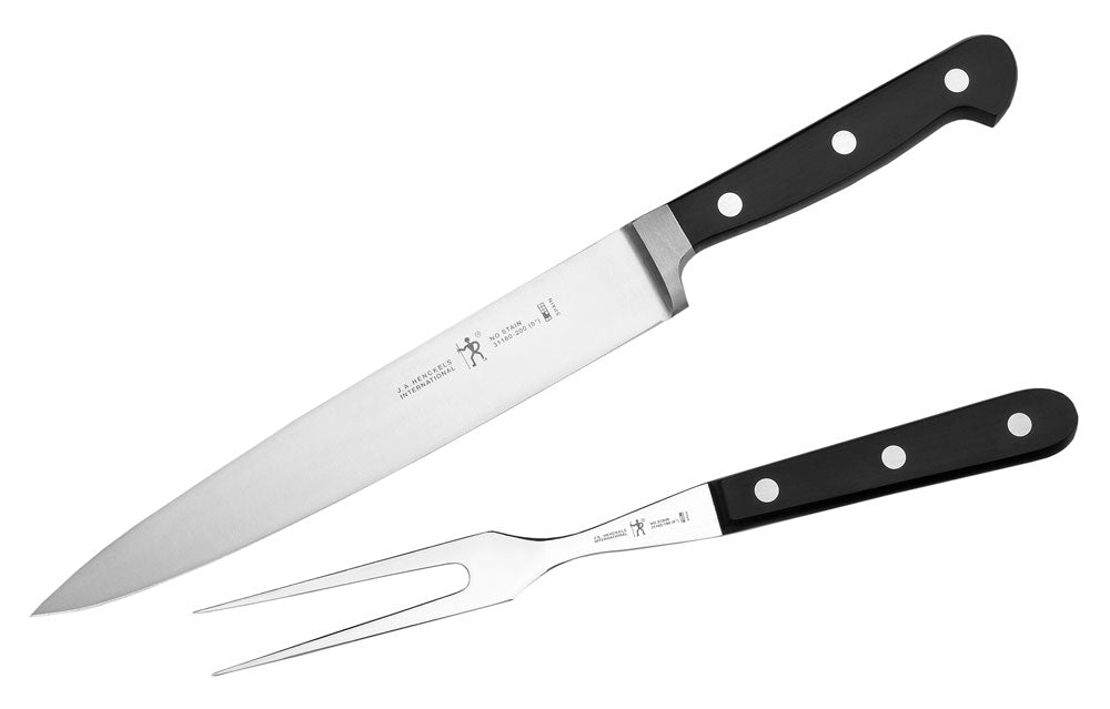 Carving knife and fork set with black handle rivets and silver blades