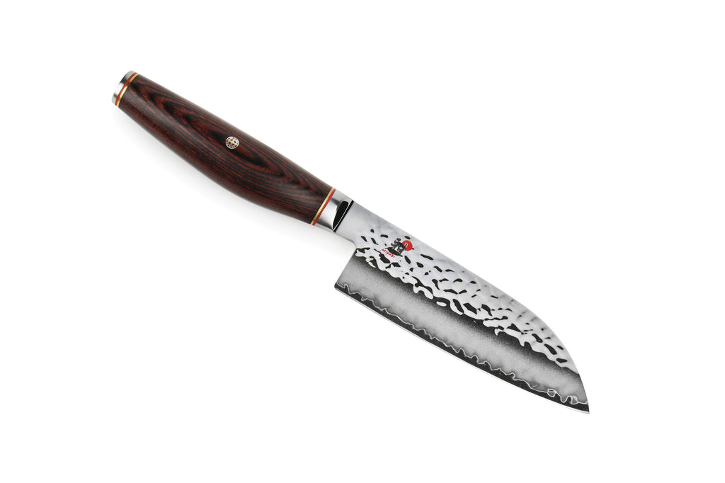 Santoku knife with patterned steel blade and dark wood handle