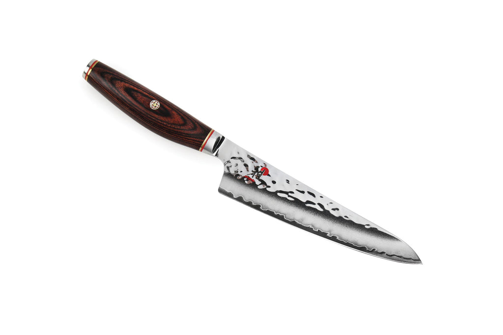 5.25-inch prep knife with dark wood handle and stainless steel blade