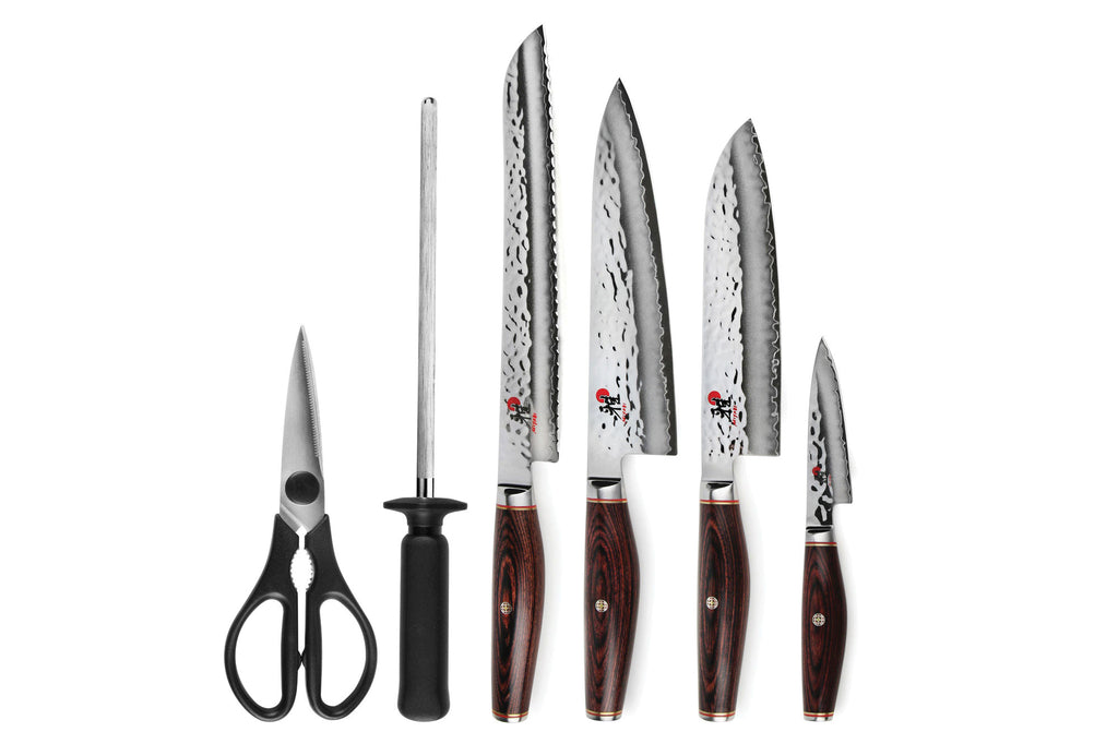 7-piece knife set with dark-handled blades and black-handled scissors