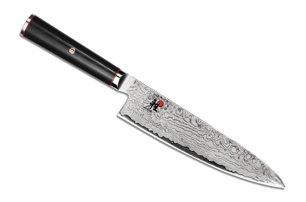 Chef's knife with Damascus-style blade and black handle