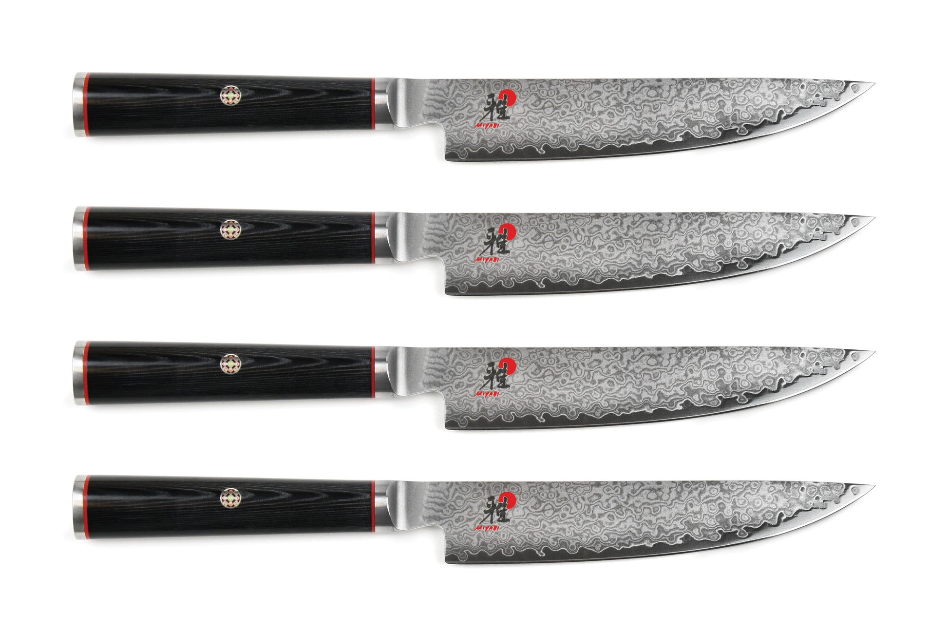 Miyabi Kaizen steak knife set, four damascus-style blades with black handles