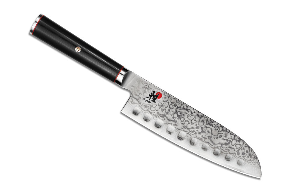 7-inch Santoku knife with black handle and Damascus-style blade