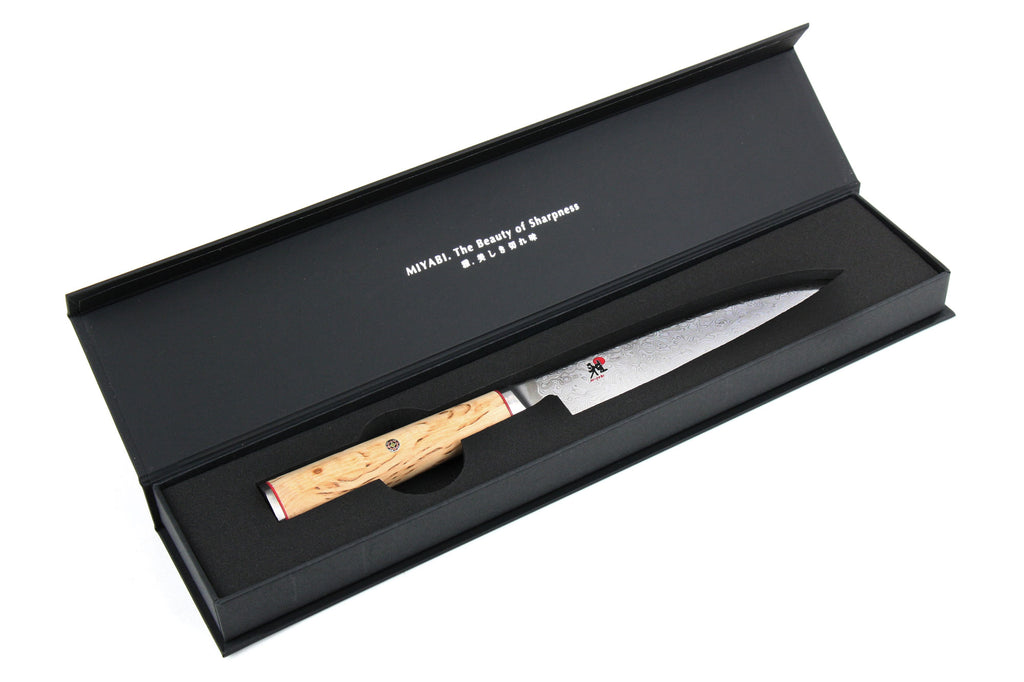 Utility knife in black gift box with birchwood handle and Damascus-style blade
