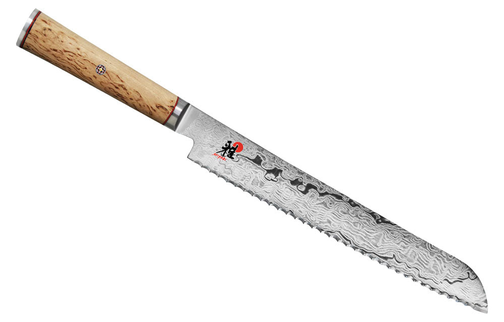 Bread knife with birchwood handle and Damascus-style etched blade