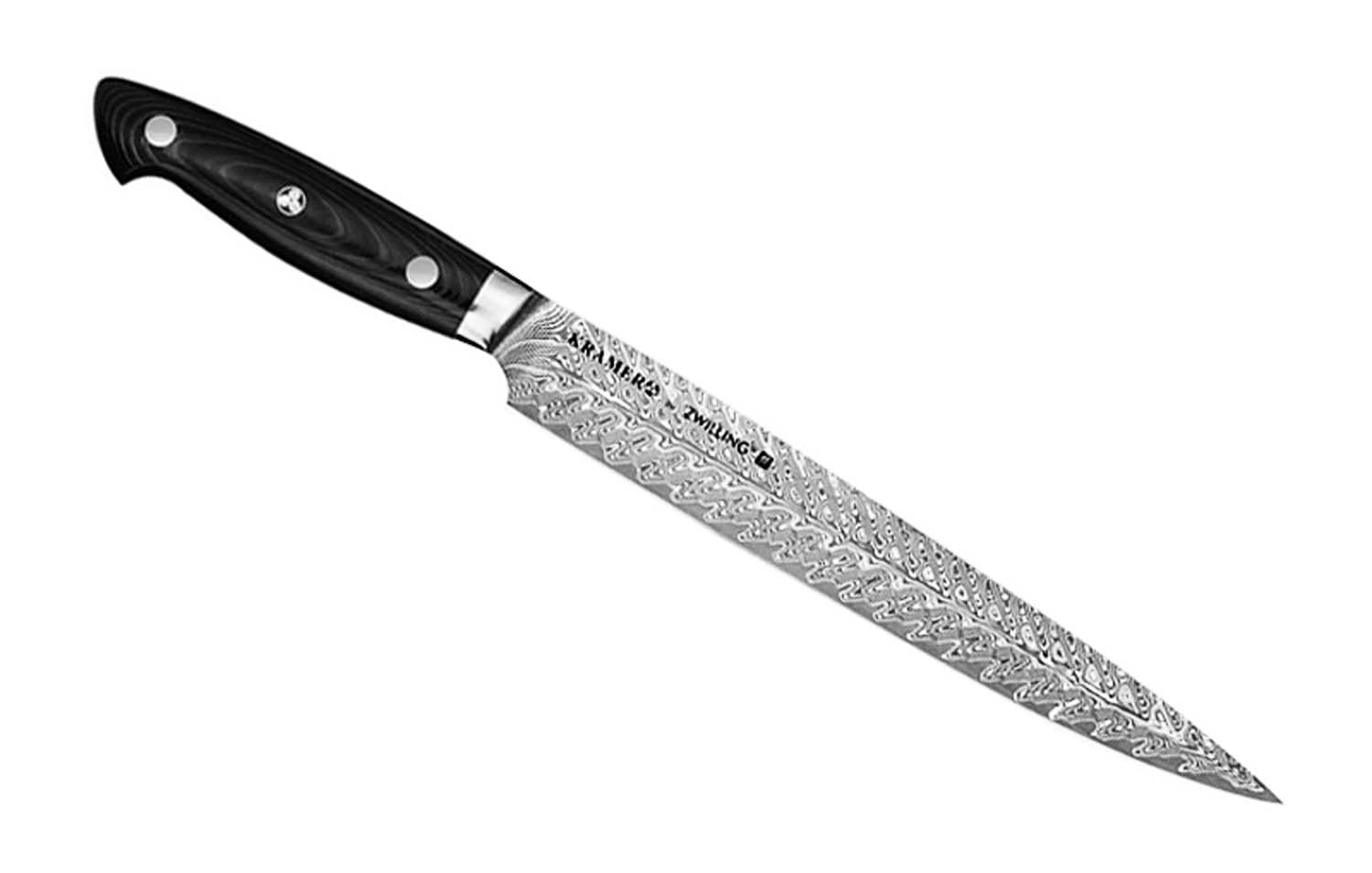 Santoku-style knife with dark handle, rivets, and damascus-patterned blade.