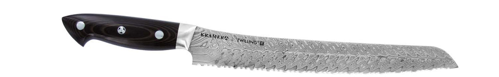 Bread knife with serrated steel blade and black handle; Damascus pattern on blade
