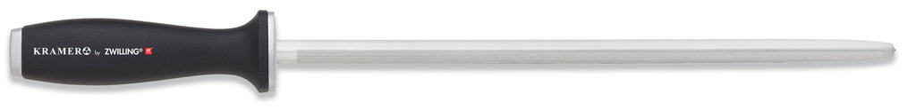 Stainless knife with dark handle and straight blade edge, storage-ready.