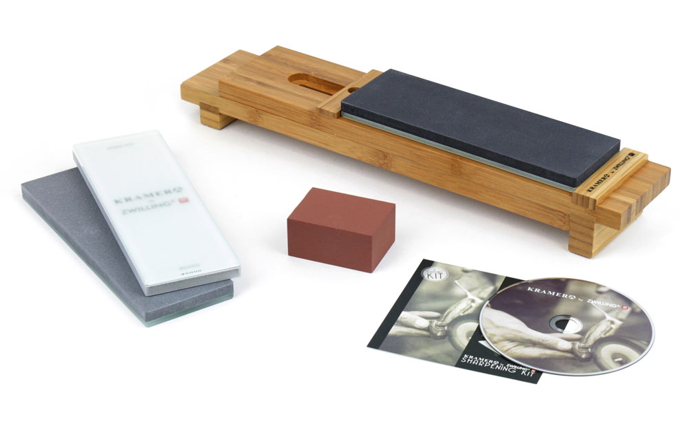 Knife sharpening set with wooden holder, dark water stones, red sharpening block, cards