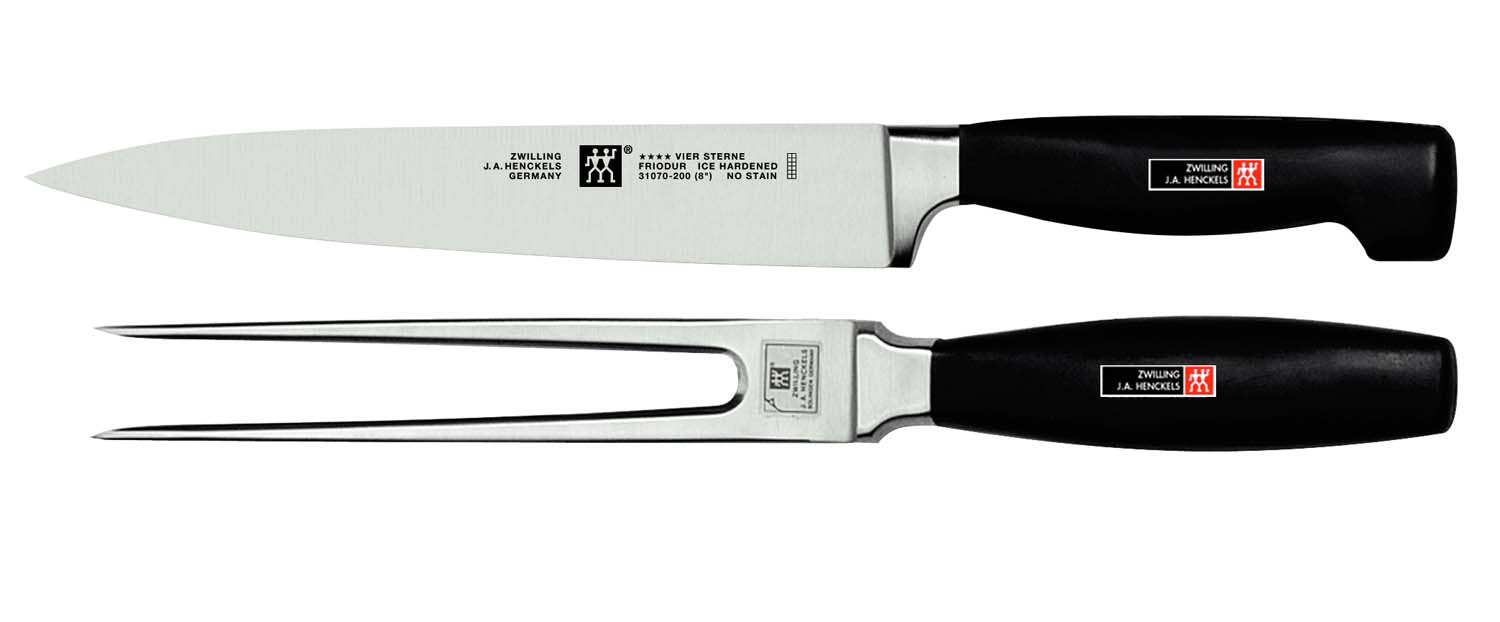 Zwilling J.A. Henckels Four Star carving knife and carving fork set, black handles