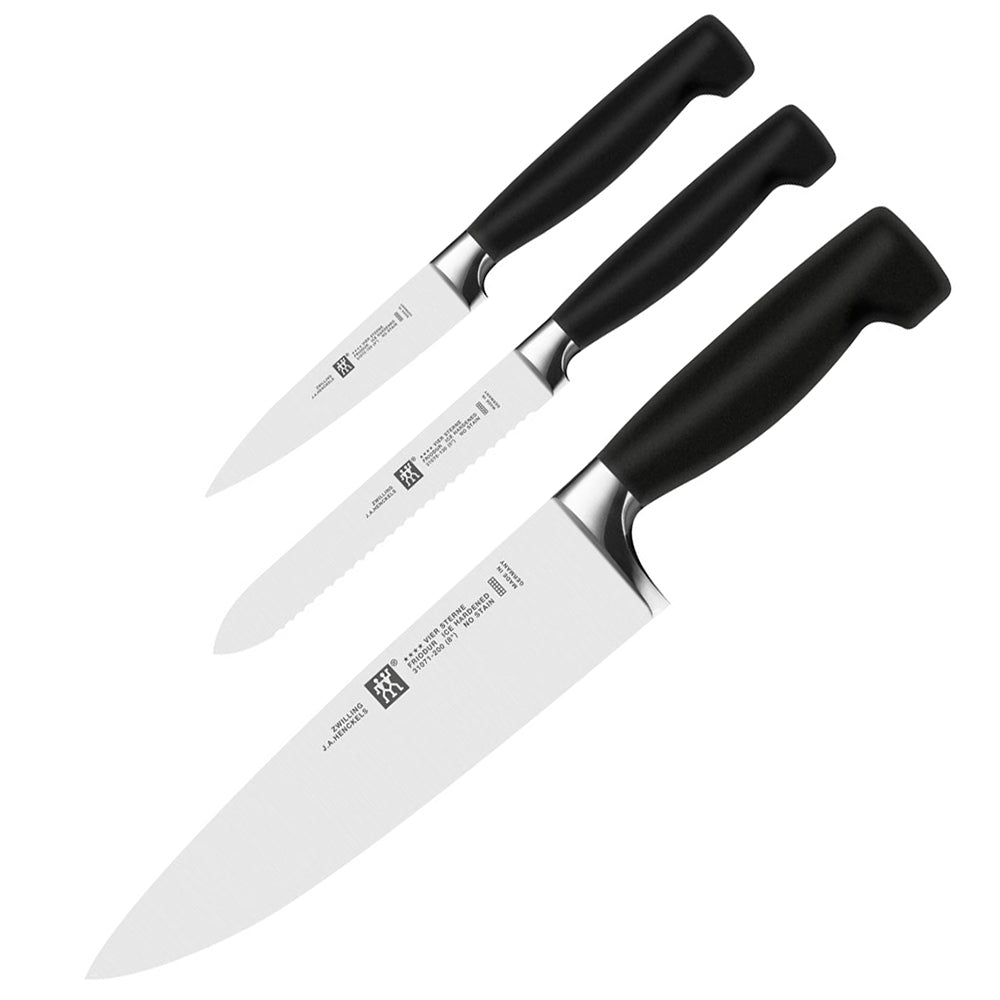 Knife set with three black-handled blades and stainless steel cutting edges