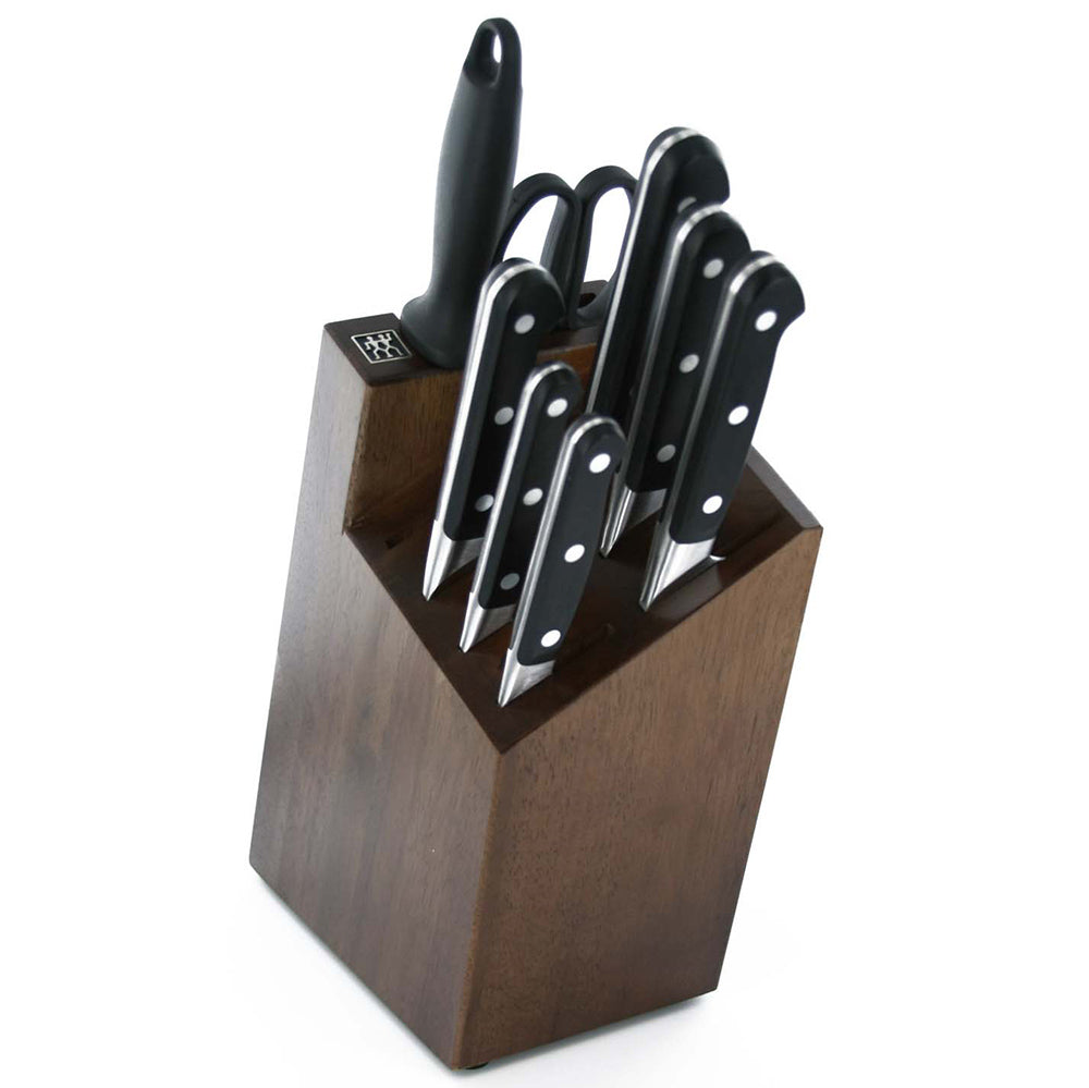 Wooden knife block set with multiple black-handled knives and white rivets