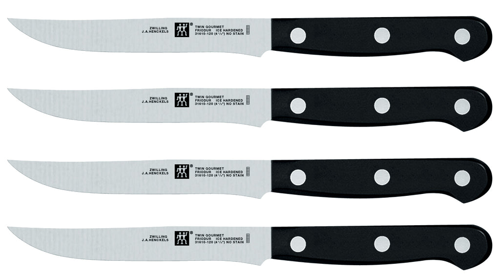 4-piece steak knife set with black handles and stainless steel blades