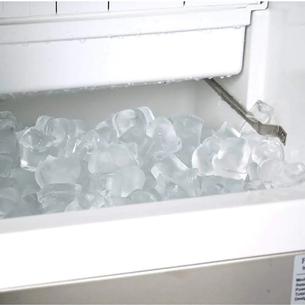 Outdoor ice maker with open bin filled with clear ice cubes