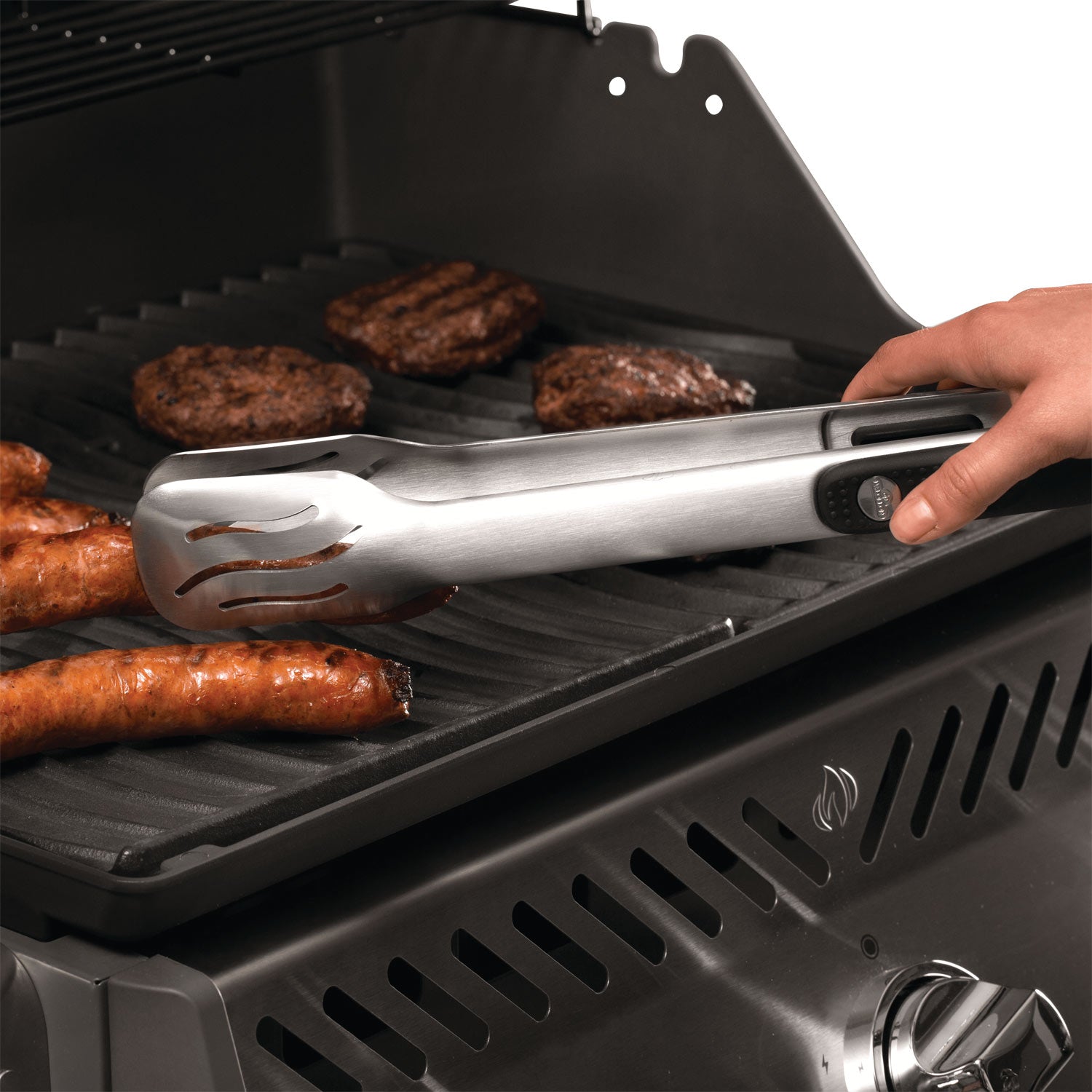 Napoleon reversible cast iron griddle on grill, with handle and vented side