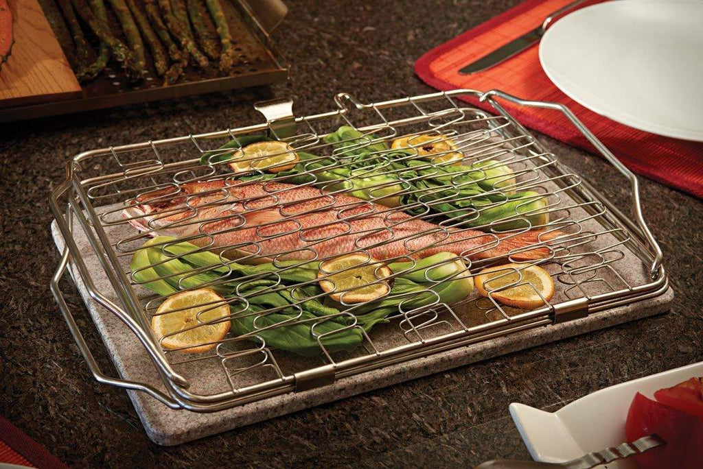 Napoleon flexible grill basket with wire mesh holding mixed vegetables and seafood