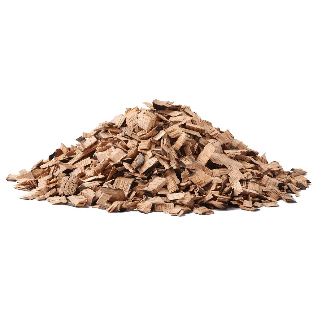 Napoleon whiskey barrel wood chips in a pile of light brown wood pieces