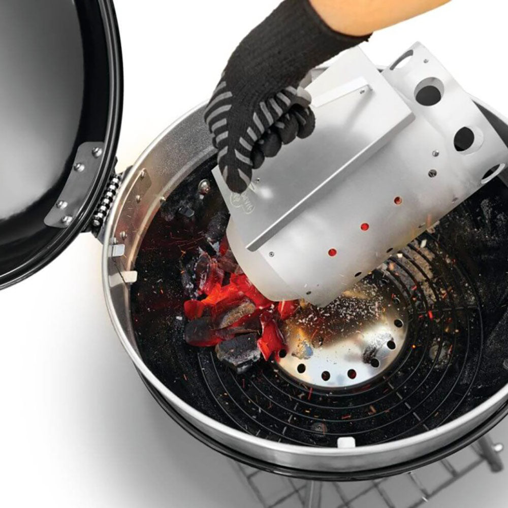 Charcoal starter insert tipping over coals in outer chamber, stainless steel