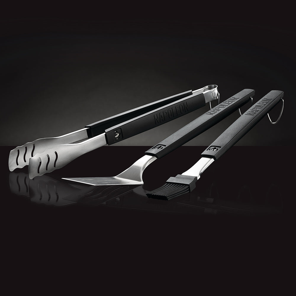 Three BBQ tools with stainless heads, black grips, and hanging loops