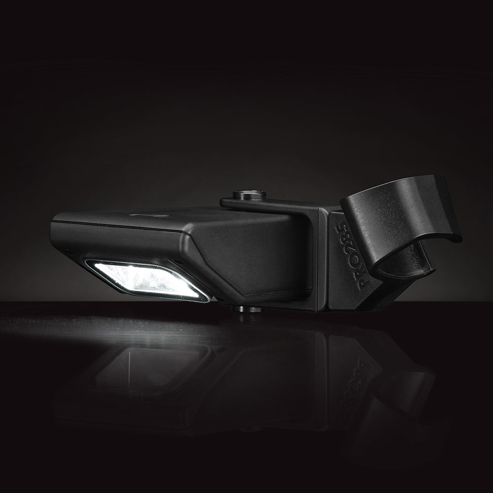 Rectangular LED light on black grill handle with protective dark housing