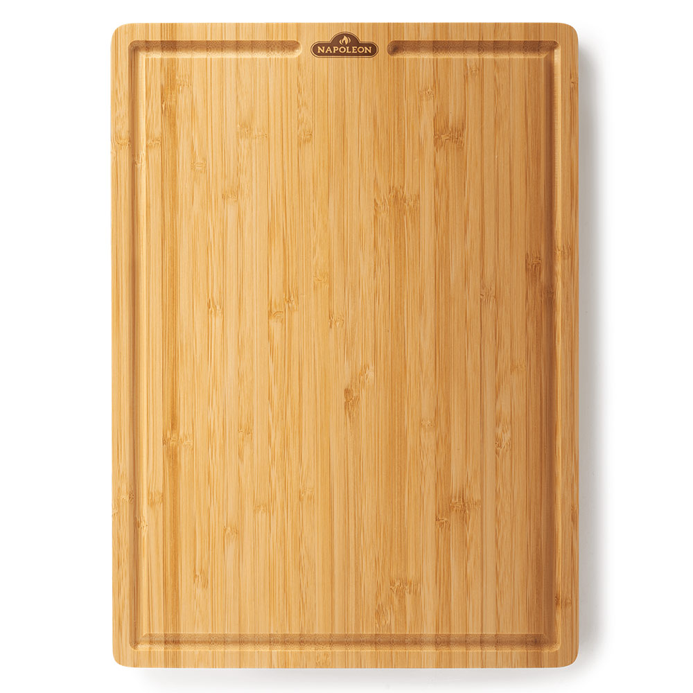 Napoleon bamboo cutting board, rectangular with raised edge and logo.