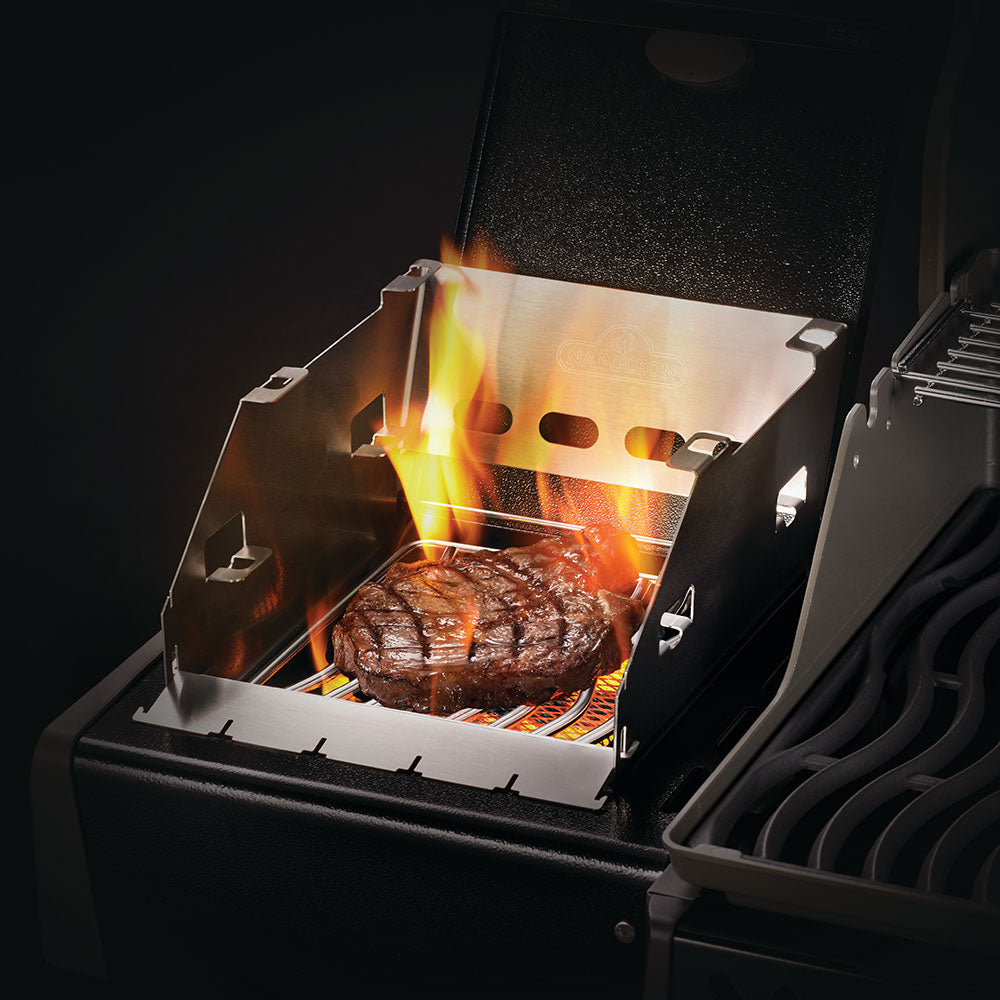 Stainless side burner windbreak and skewer rack, open front, holding steak