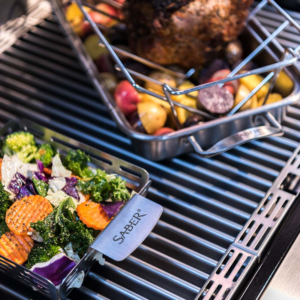 Grill grate with cooked food pieces on wire rack
