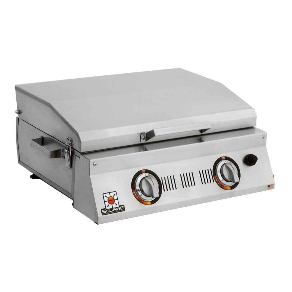 Portable infrared double burner grill with lid closed and control knobs on front panel