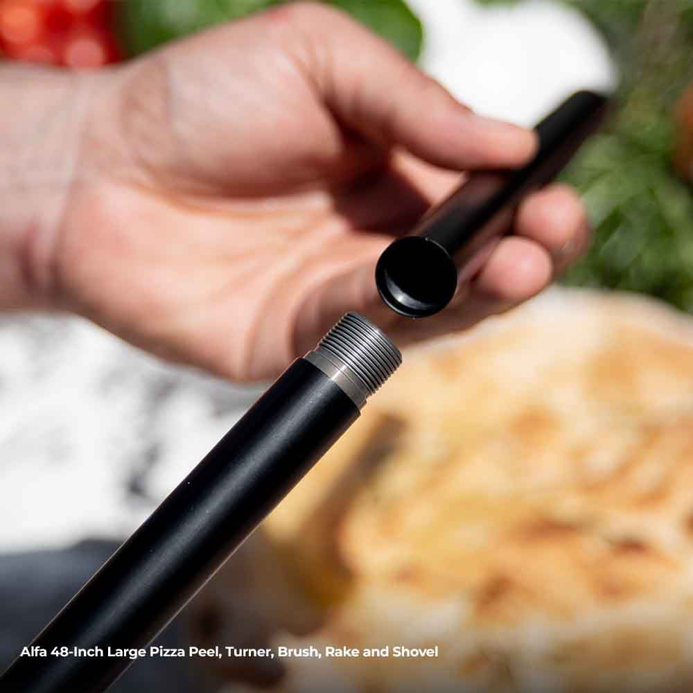 Black-handled pizza tool with ribbed grip and end cap