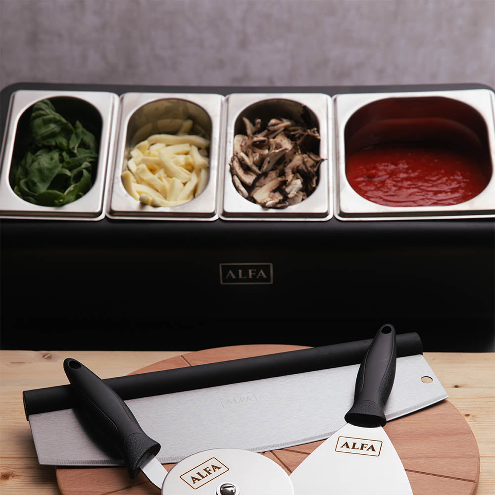 Alfa topping station with four filled stainless wells and black serving tools