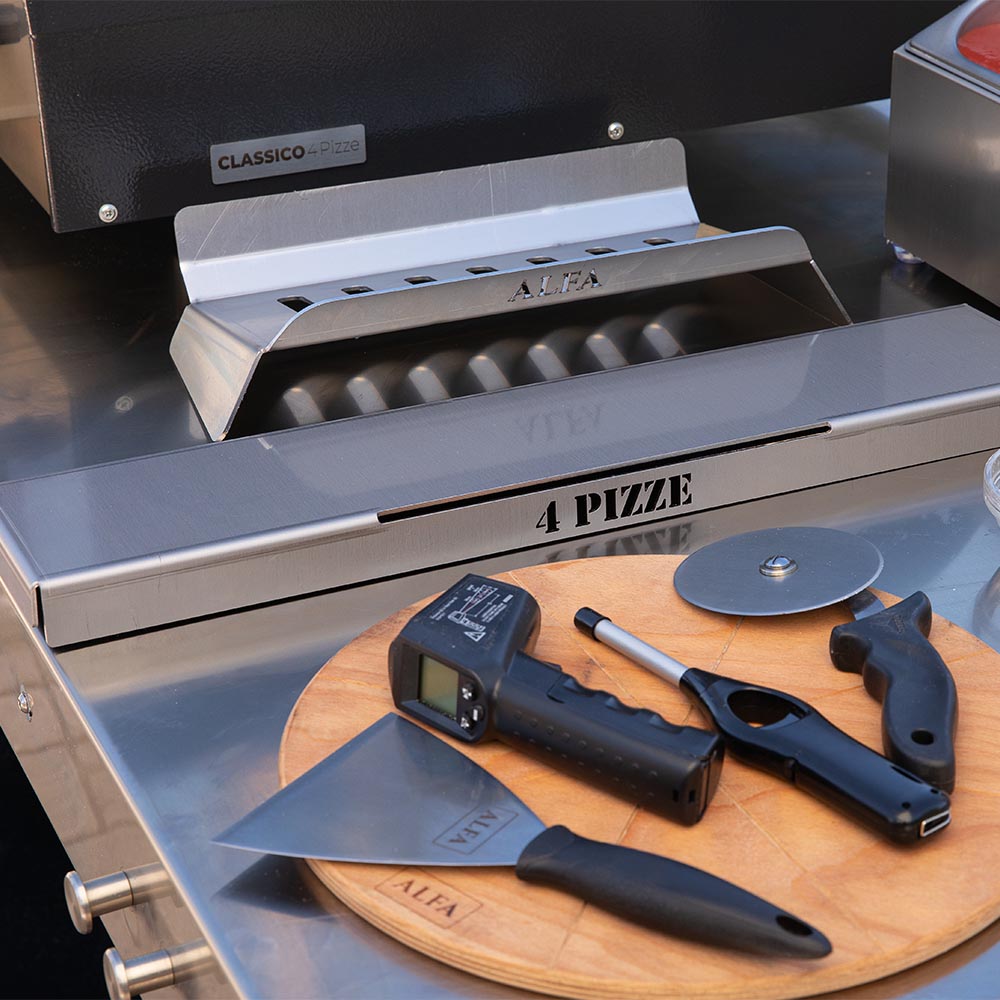 Alfa pizza oven hybrid kit with slotted burner insert, tools, and wood board