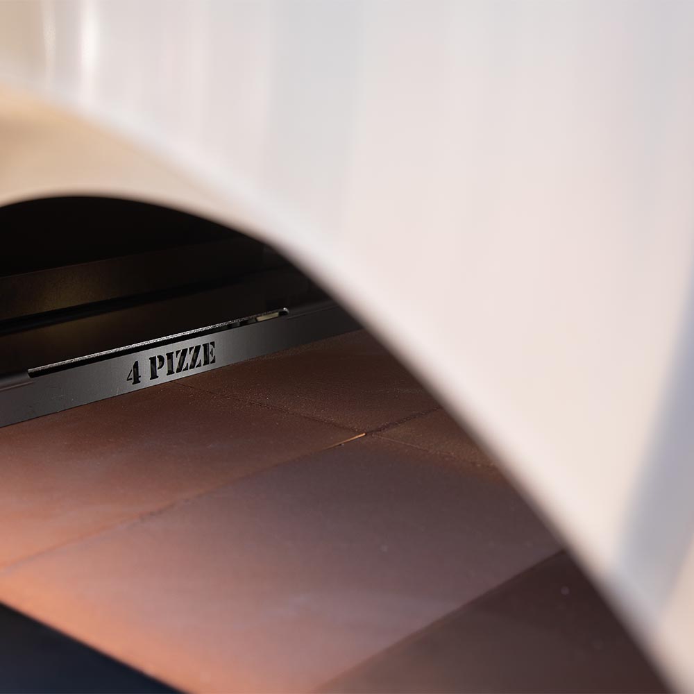 Alfa pizza oven interior view with heated floor and labeled 4 pizza chamber door