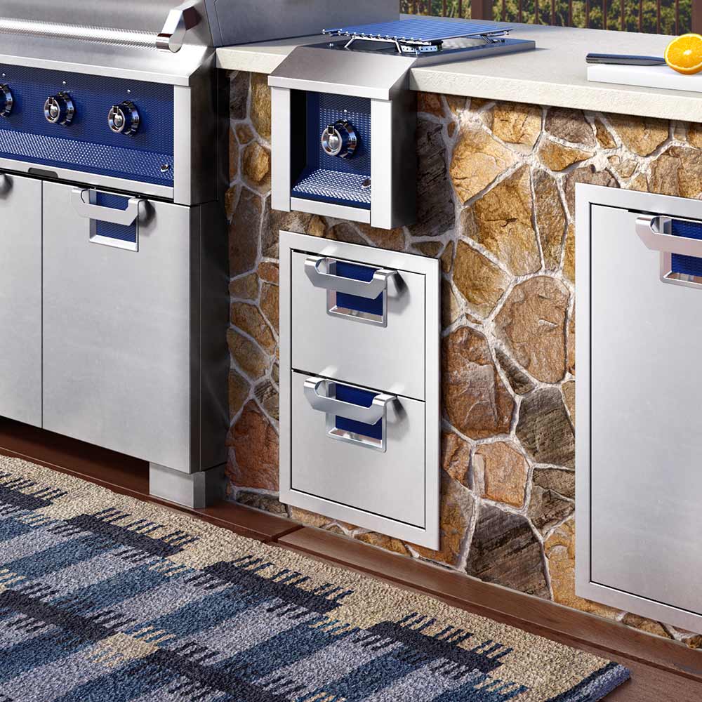 Double storage drawers with blue-lined pull-out trays and metal handles, shown open.