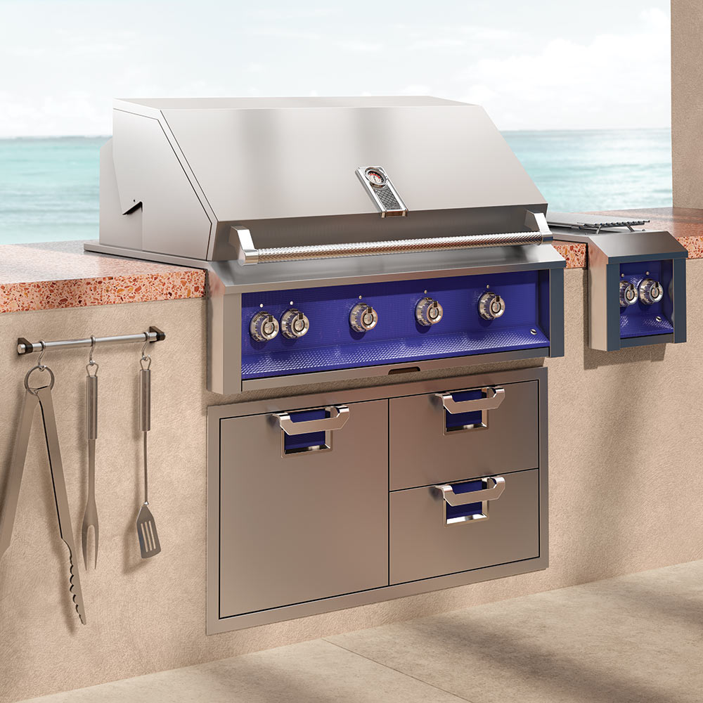 Built-in outdoor storage cabinet with two drawers and open side compartment, blue interior
