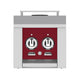 Double side burner control panel with two circular knobs on burgundy faceplate