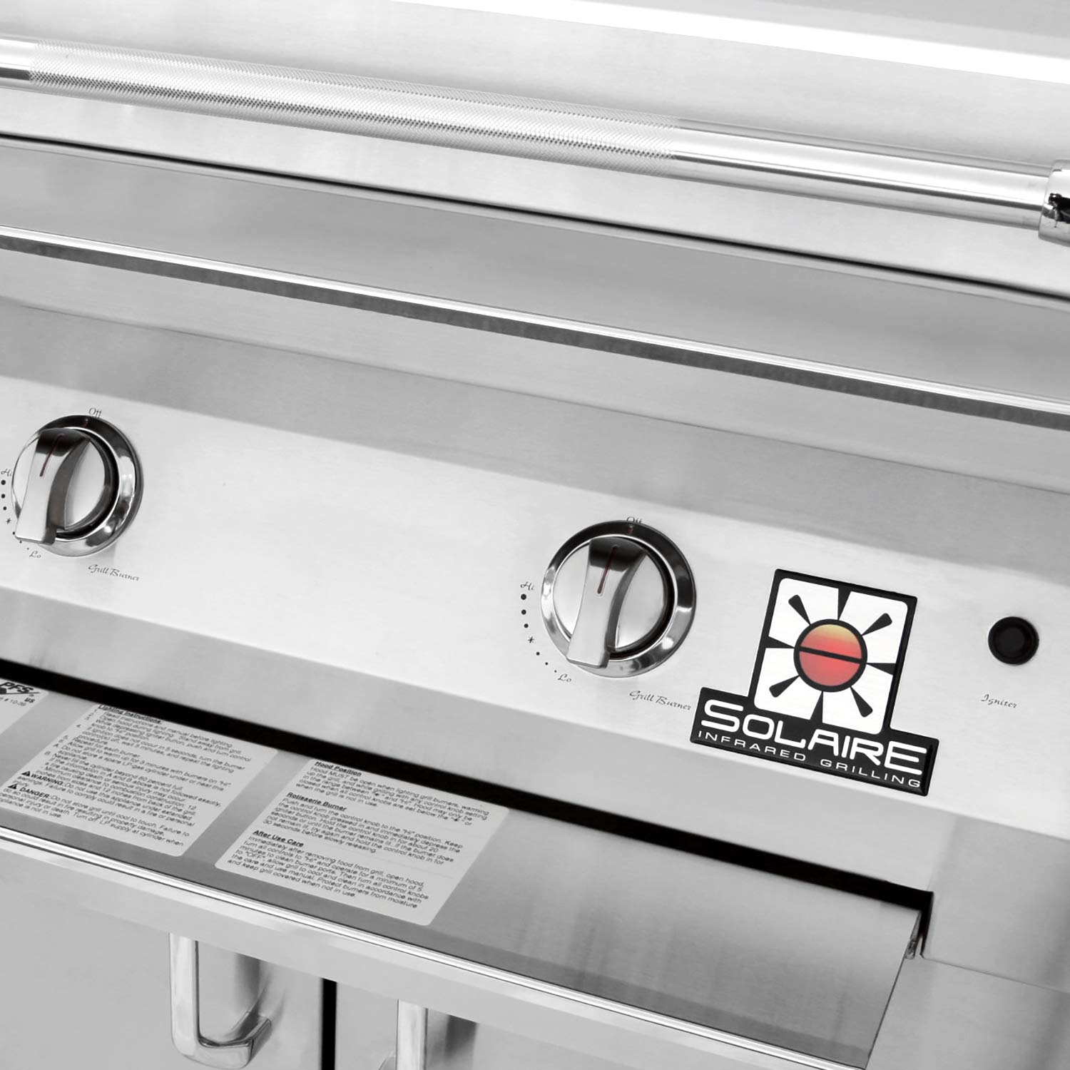 Stainless steel grill control panel with burner knobs and Infrared symbol