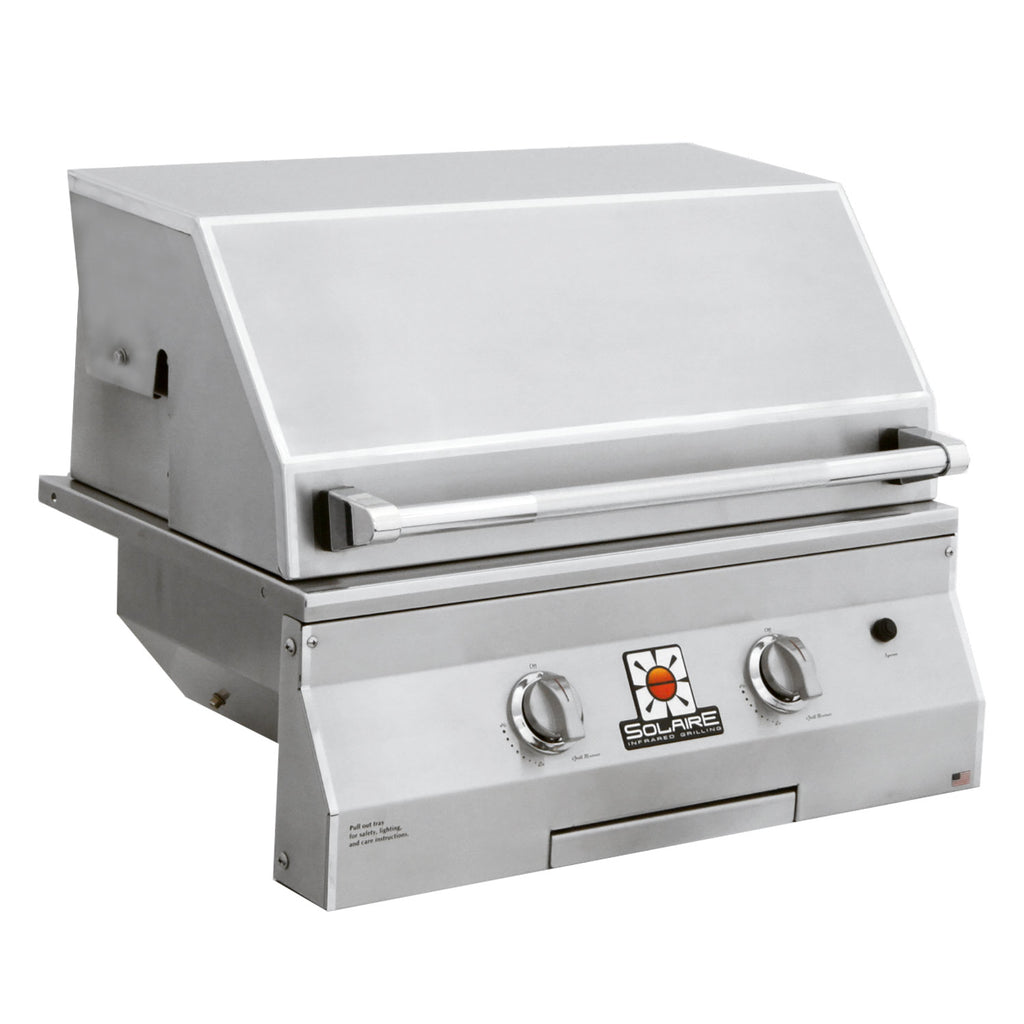 Stainless built-in gas grill with closed lid and front control knobs