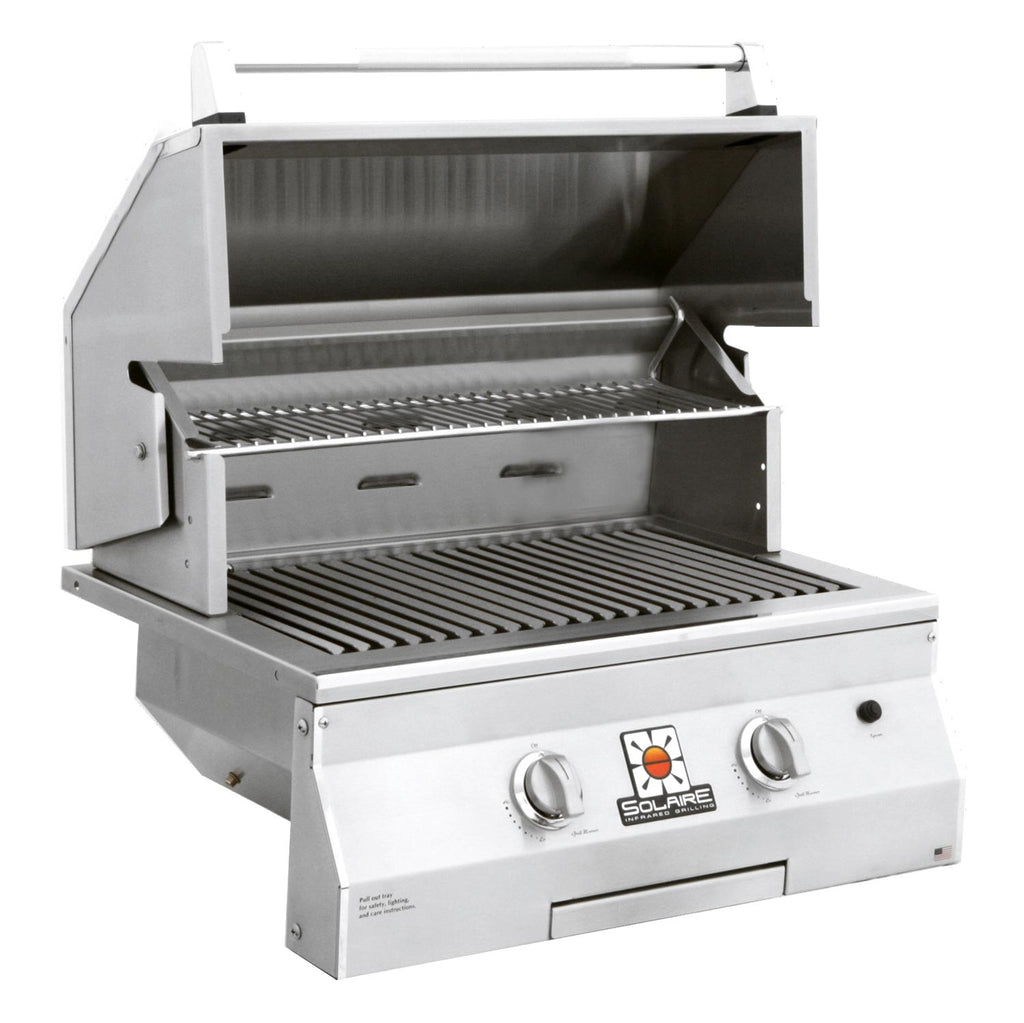 Stainless built-in gas grill with open hood and cooking grates