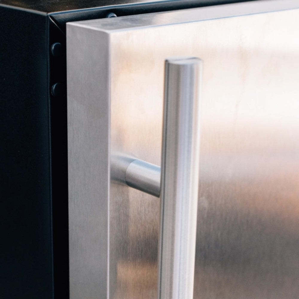 Refrigerator door handle and stainless frame, close-up