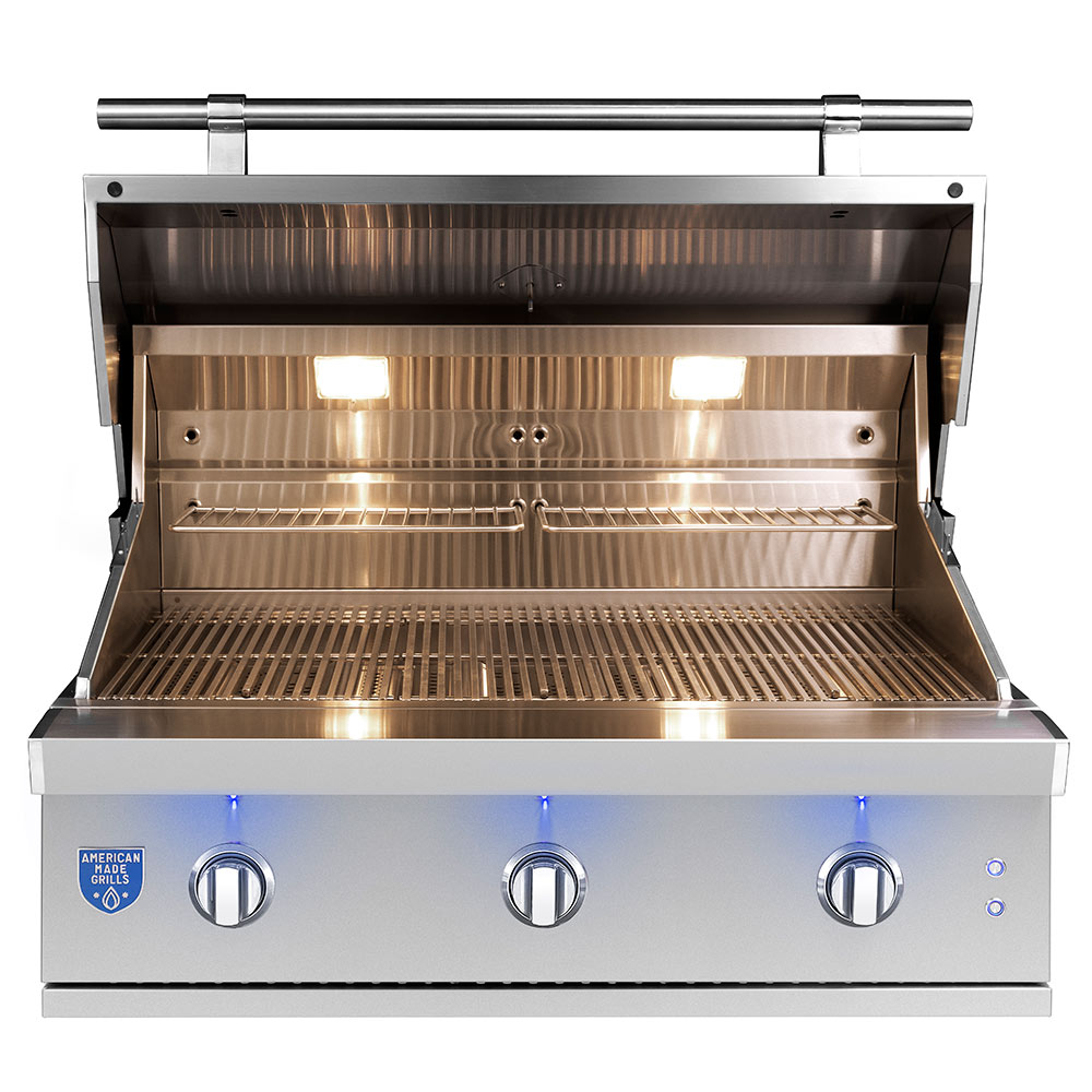 36-inch built-in gas grill open with stainless burners and cooking grates visible