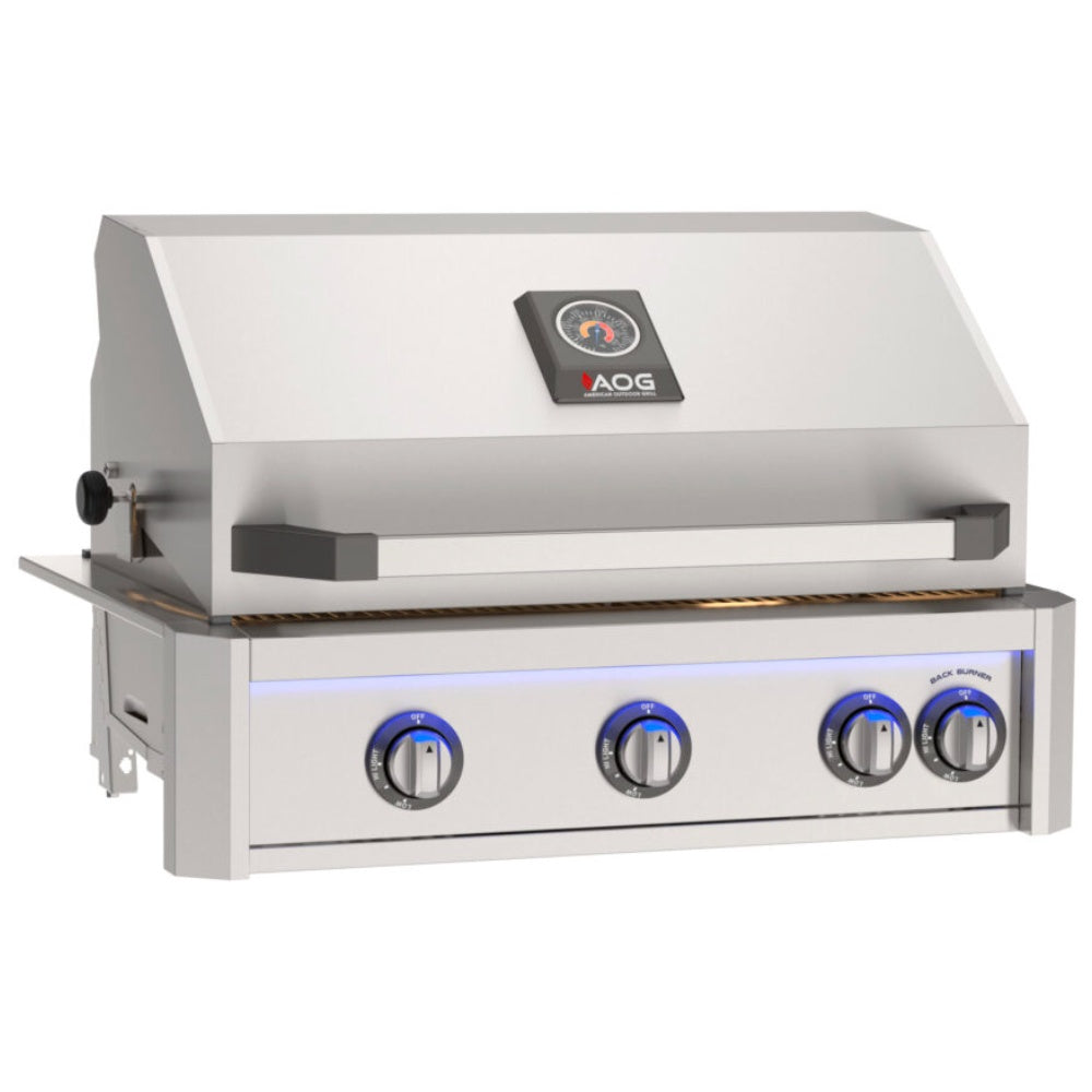 Built-in stainless gas grill with warming hood, black logo panel, and blue indicator lights