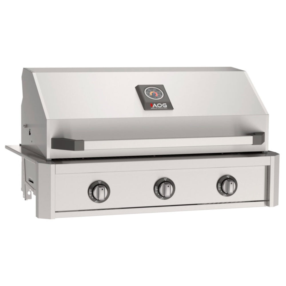 Built-in gas grill with stainless lid closed and three round burner control knobs