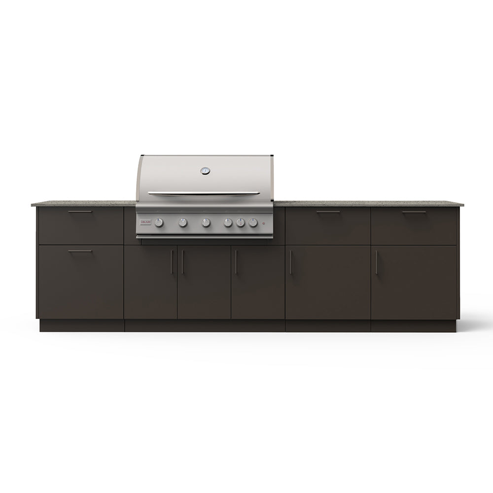 Outdoor kitchen island with light beige countertop and dark grill island base