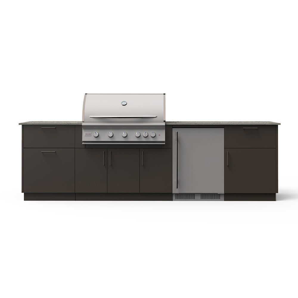 Outdoor kitchen island with grill top and fridge compartment in dark cabinet