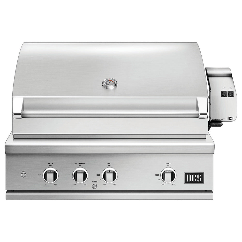Stainless steel built-in gas grill with closed hood and four control knobs