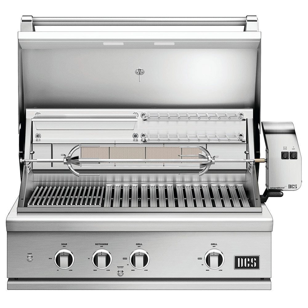Stainless steel built-in gas grill with open hood, rotisserie rod, and burner grates