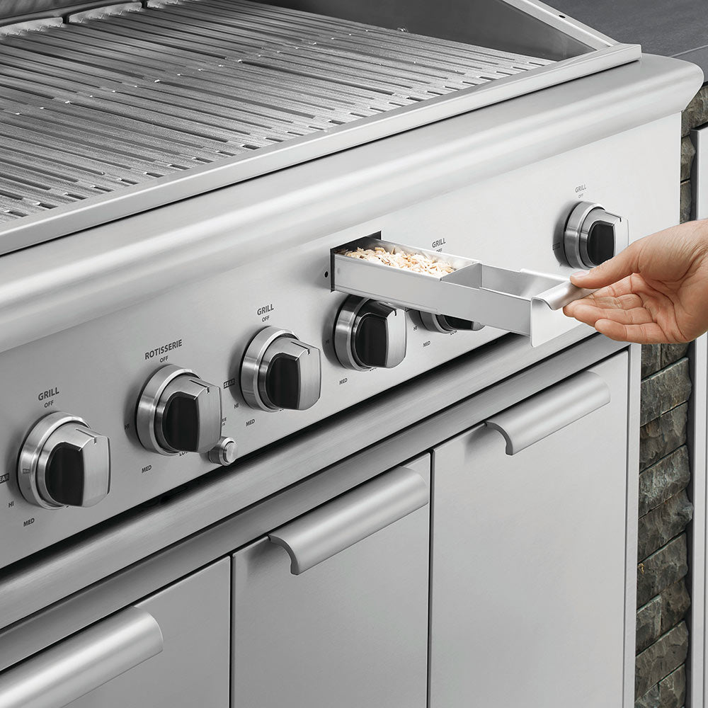 Built-in gas grill with slide-out sear tray and front burner controls