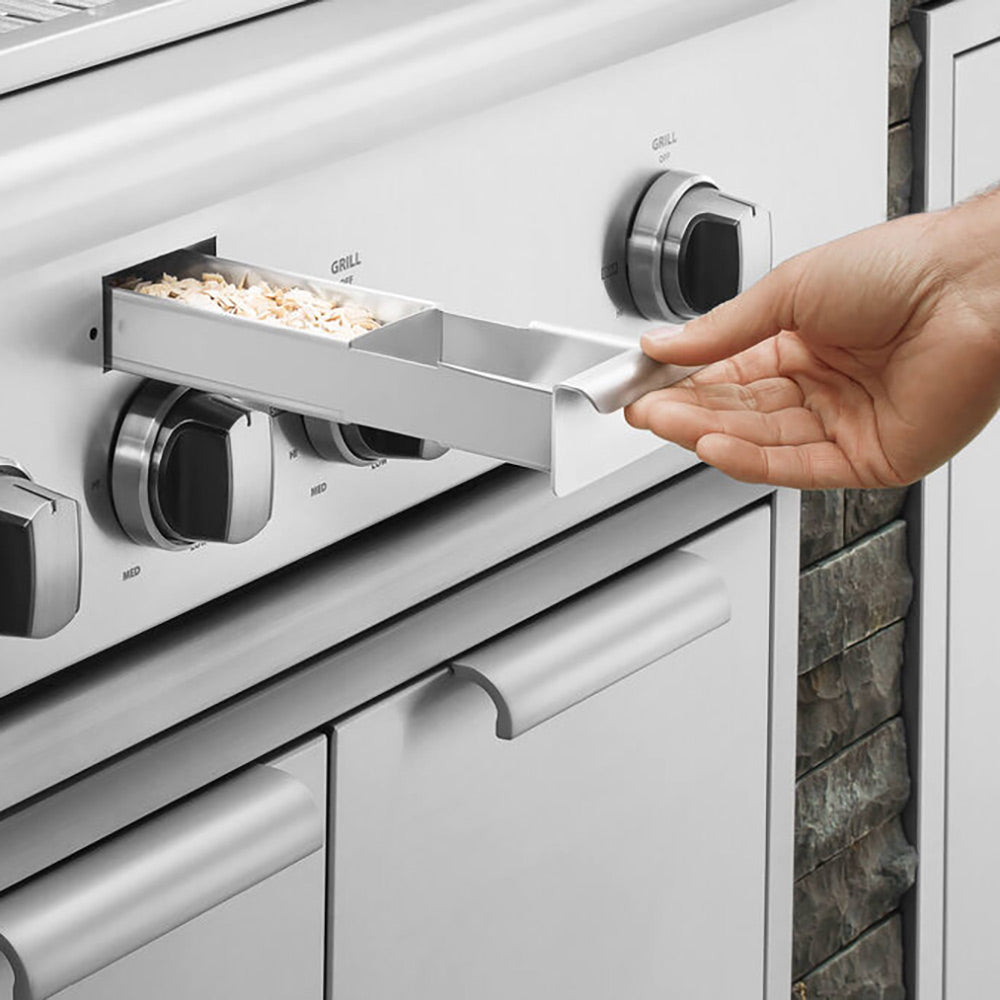 Built-in gas grill control panel with knobs and rotisserie compartment open