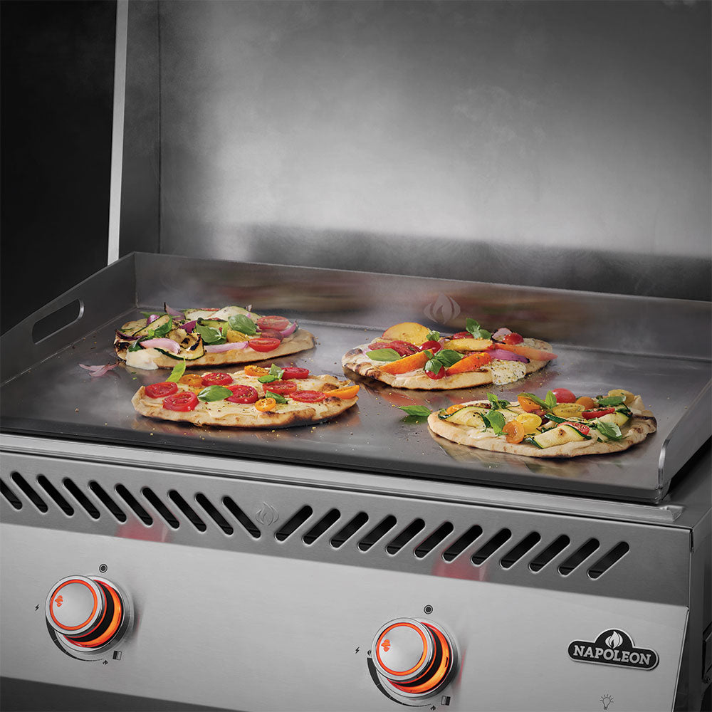 Stainless steel flat top griddle with two control knobs and vented front panel